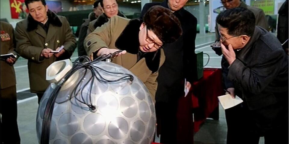 Kim Jong Un inspecting a purported fission device for a ballistic missile