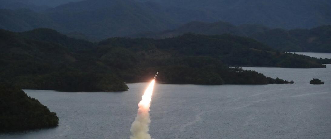 A ballistic missile is launched from an underwater canister in Taechon Reservoir in the northwest of the DPRK.